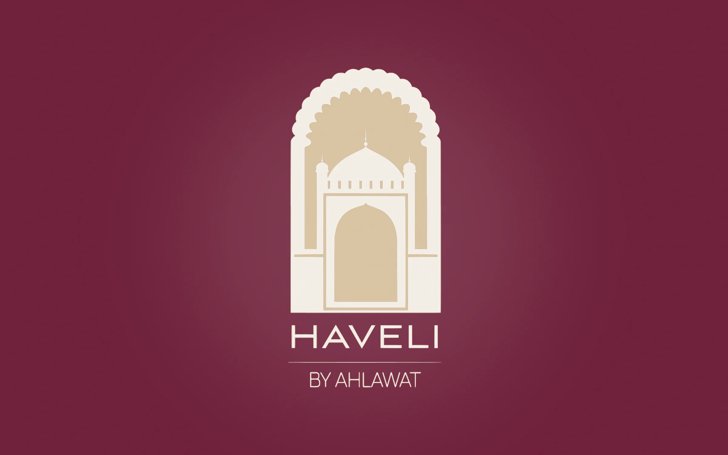 Haveli by Ahlawat arched gateway emblem on maroon